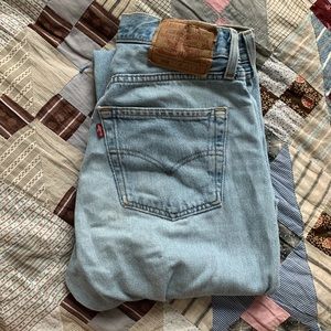 WORN IN LEVI 501 w/ butt tear